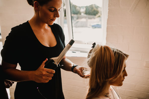 Hair being straightened